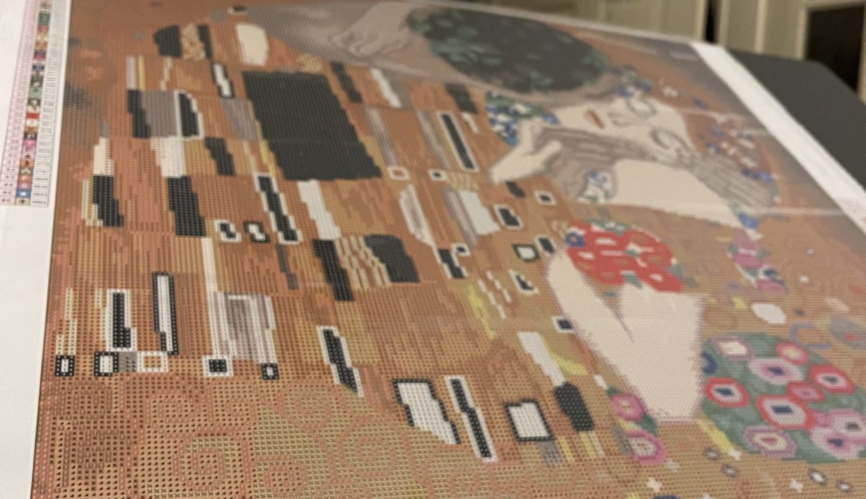 Closeup of Diamond Art Club rendering of "The Kiss" by Gustav Klimt