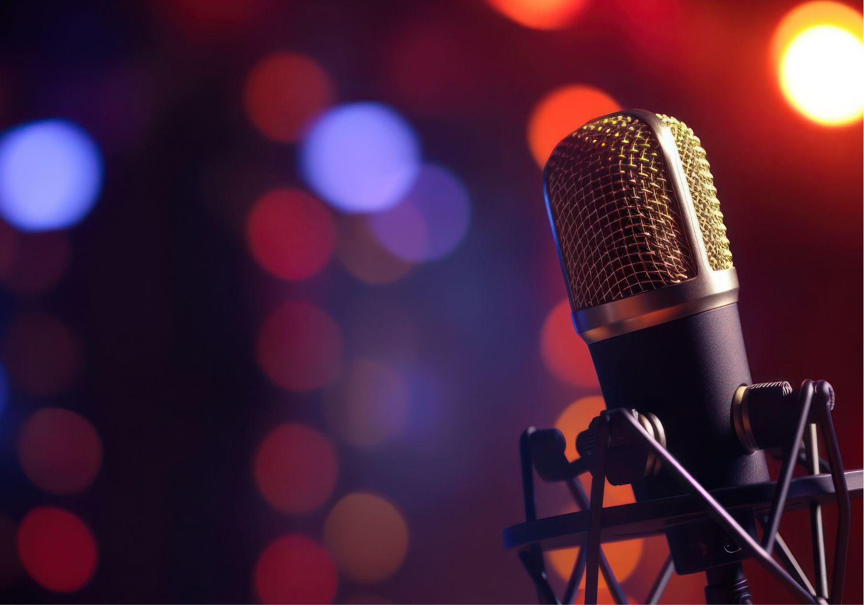 International Podcast Day: microphone with colorful bokeh background