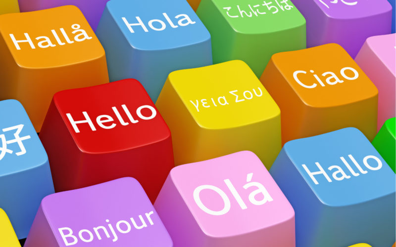 Season 1 Trailer: multicolored keyboard keys with hello labels in various languages